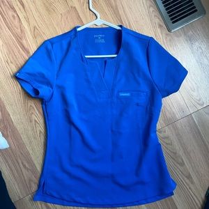 JAANUU XS ROYAL BLUE SCRUB TOP NEVER WORN